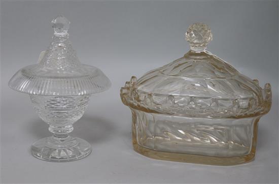 A Georgian cut glass butter bowl and cover and a cut glass sugar vase and cover